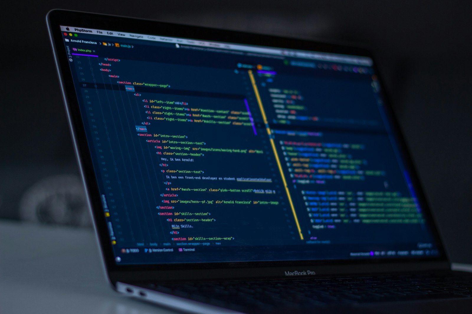 Developer workspace with code on screen